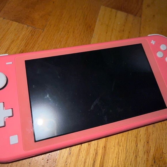 Nintendo Switch handheld console Coral, used only a couple times!